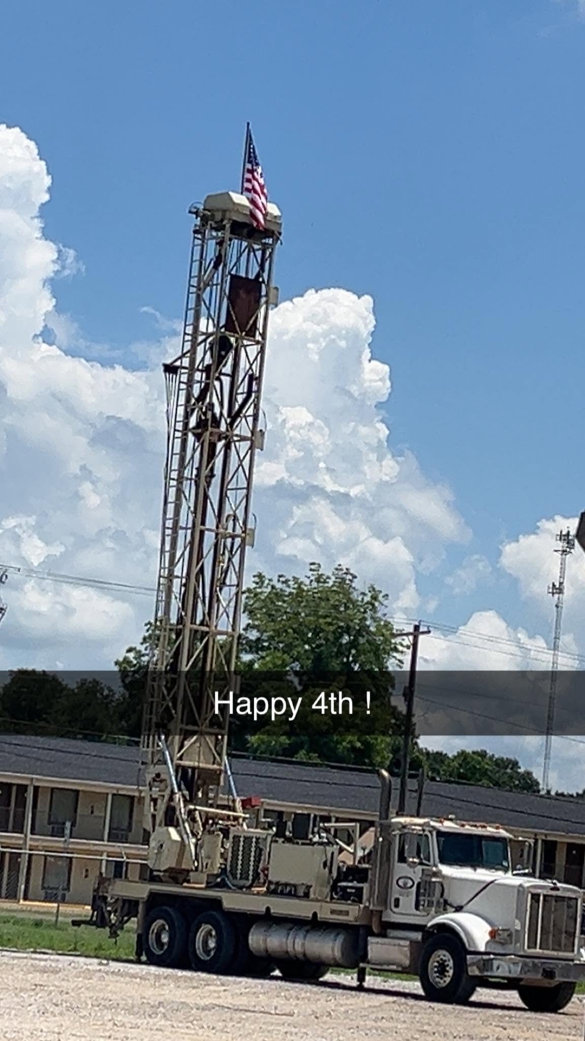 R.A.M. Drilling rig raised with an American flag on top
